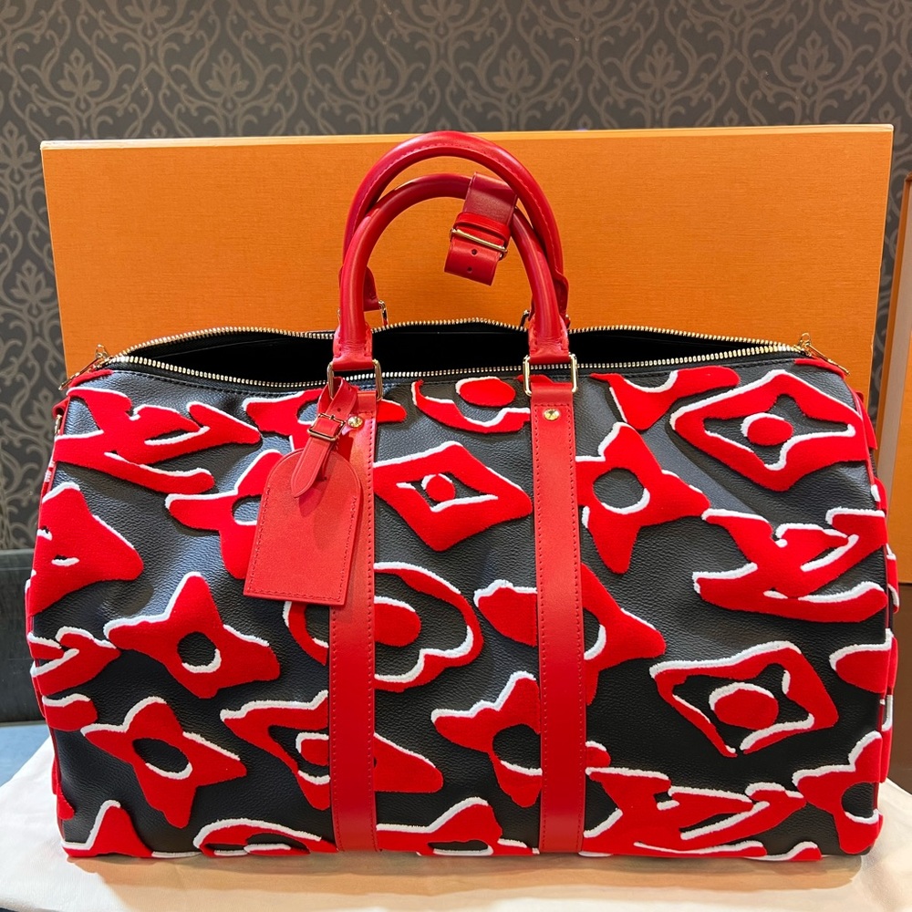 LOUIS VUITTON
KEEPALL BANDOULIERE 45